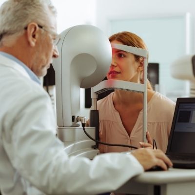 young woman getting her vision checked