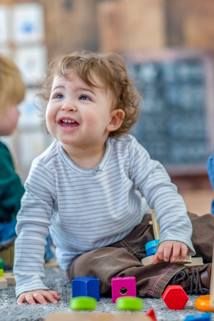 Happy toddler playing